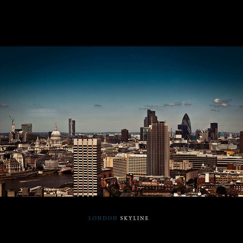 Aerial view of London skyline with planning application documents superimposed.