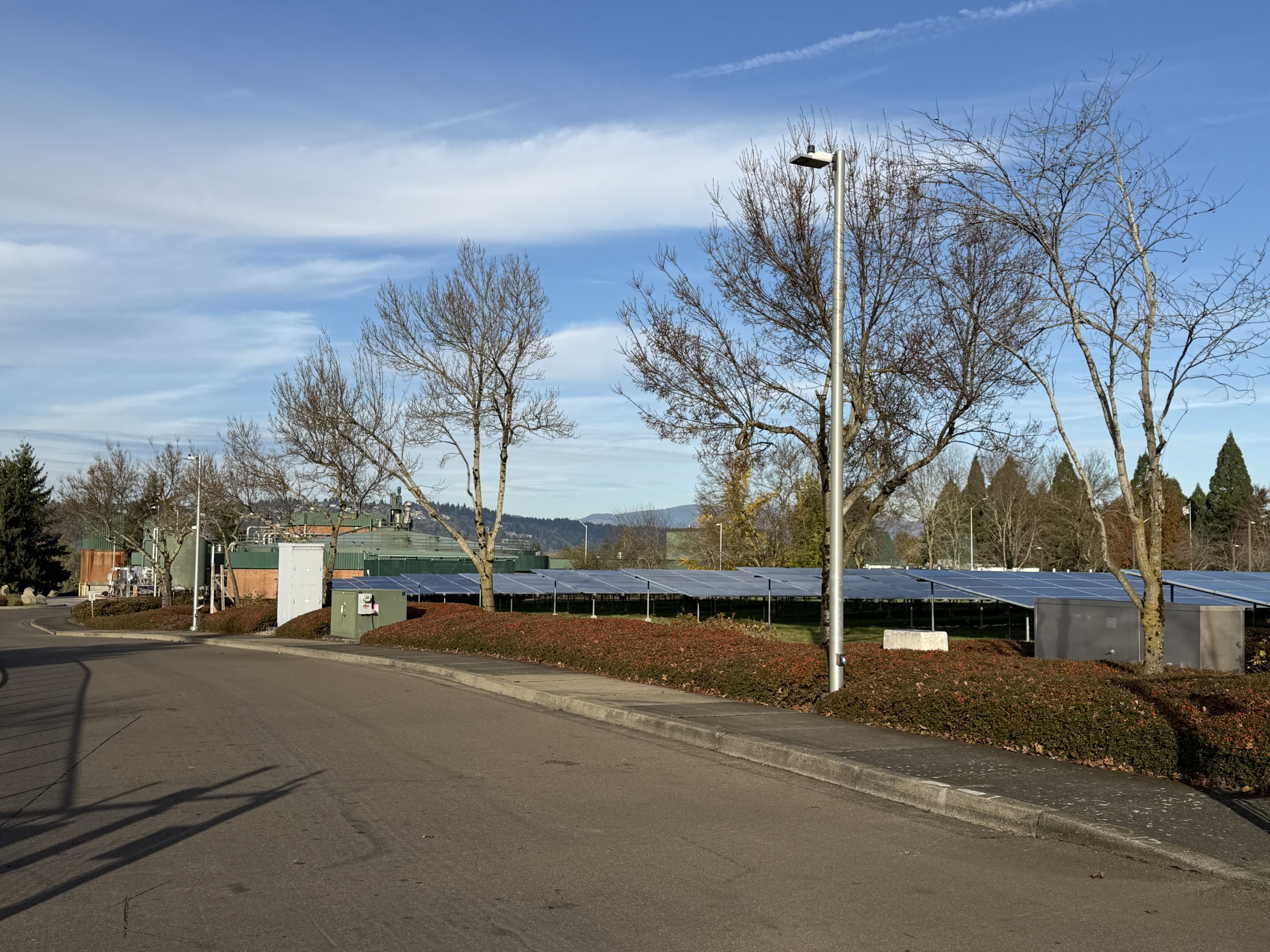 Buildings in Portland, Oregon equipped with solar panels, illustrating clean energy initiatives.