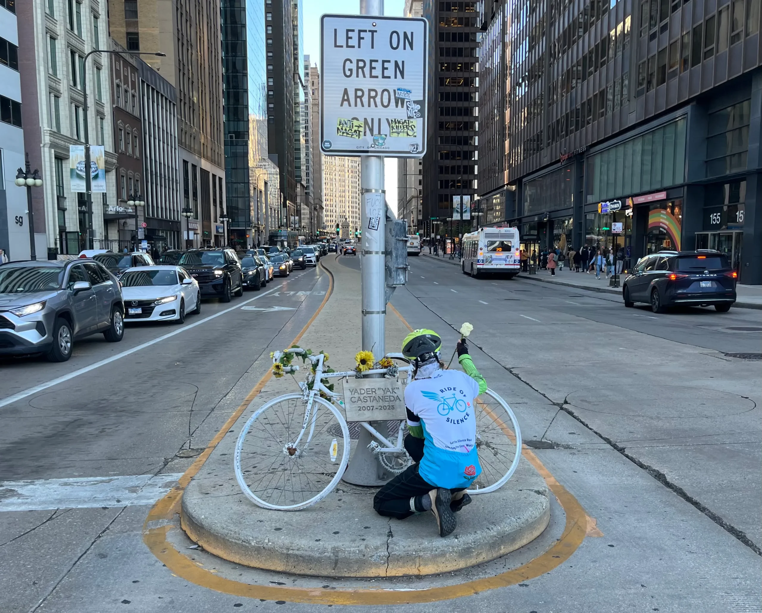 Cyclists riding in silence through city streets during a memorial event for victims of traffic violence.