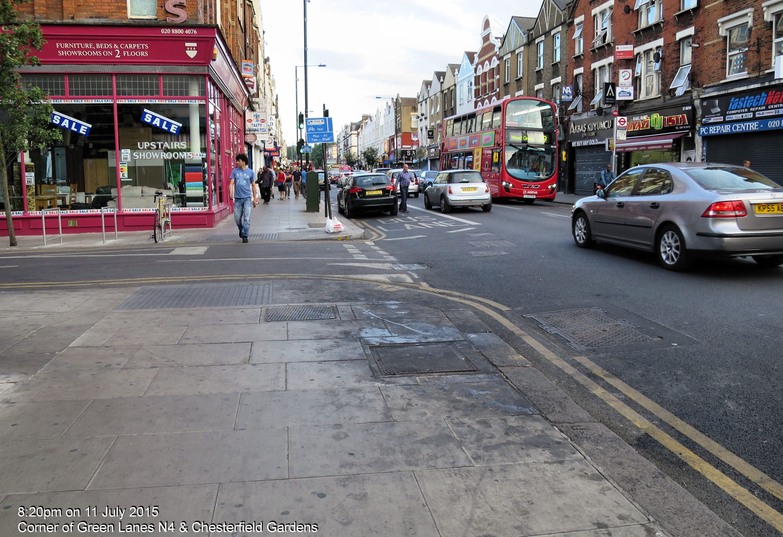 A bustling London street scene with modern and historic architecture, representing urban development and planning.
