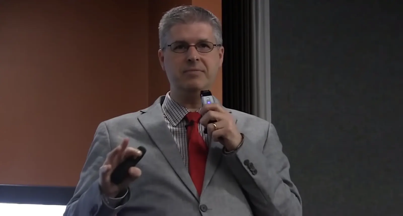 Charles Marohn, founder of Strong Towns, addressing an audience at an urban planning event.