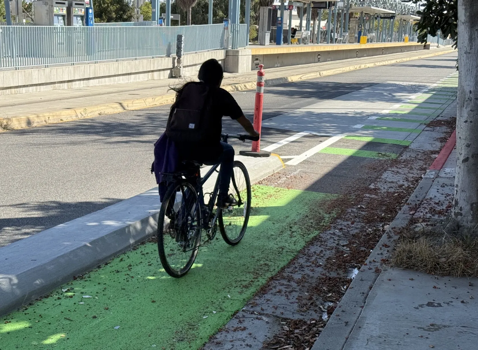 Concrete curbs delineate a protected bike lane on Colorado Avenue in Santa Monica.