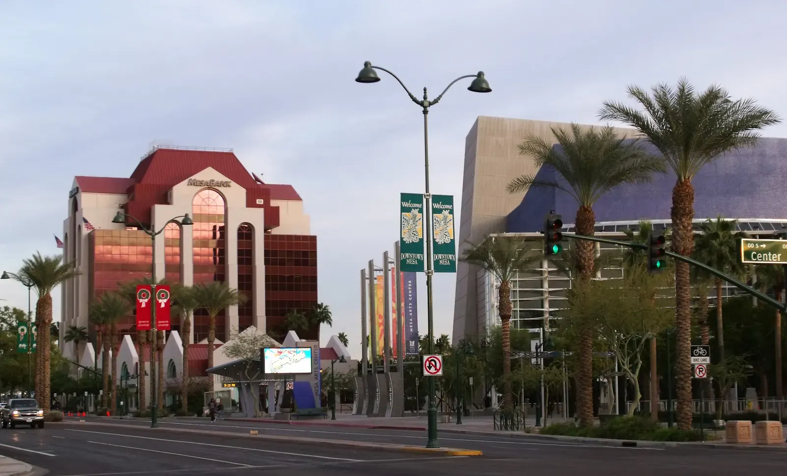 Rendering of a modern housing development with green spaces and pedestrian pathways.