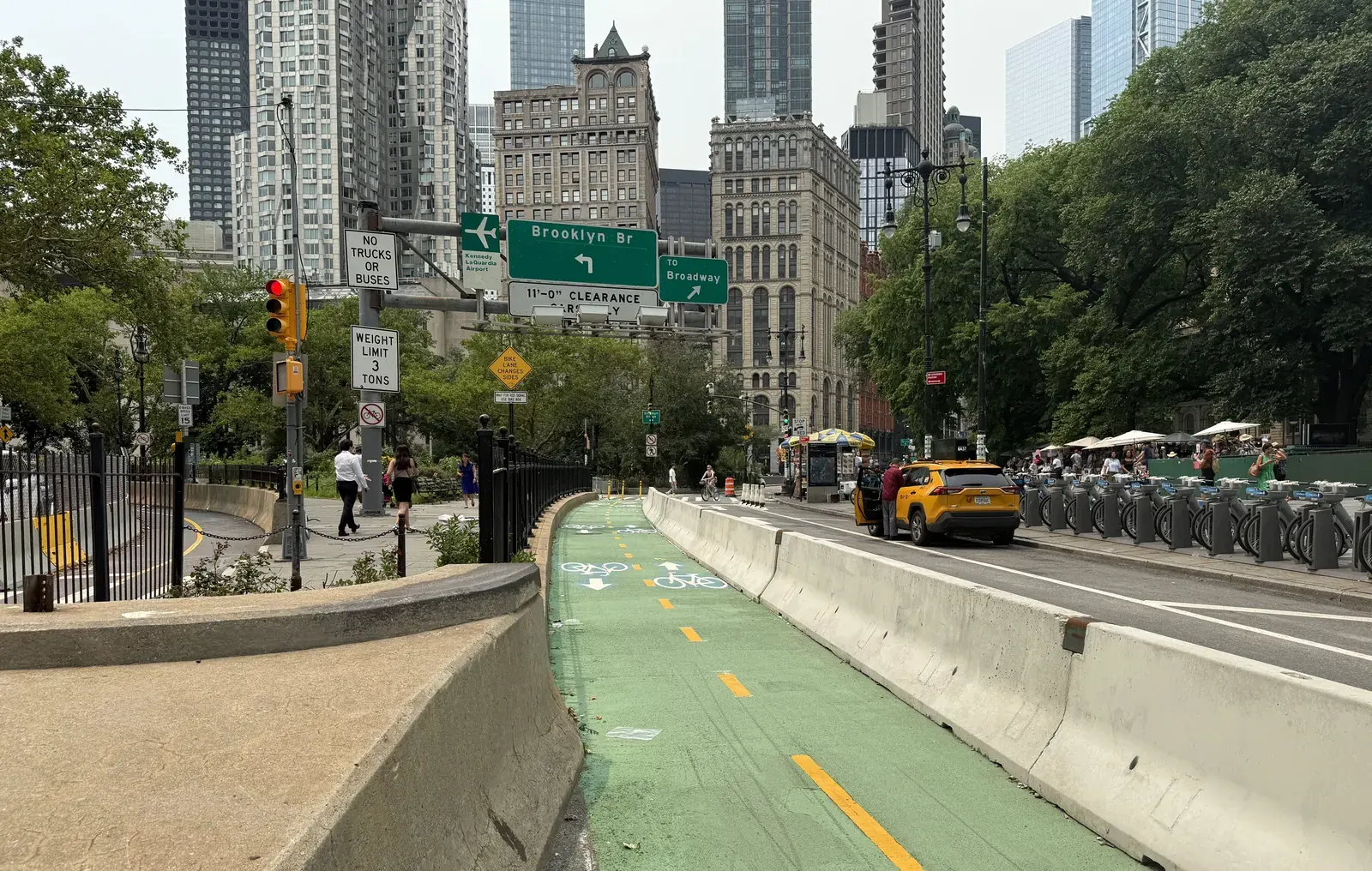 Cyclists using new infrastructure at the Manhattan entrance of the Brooklyn Bridge