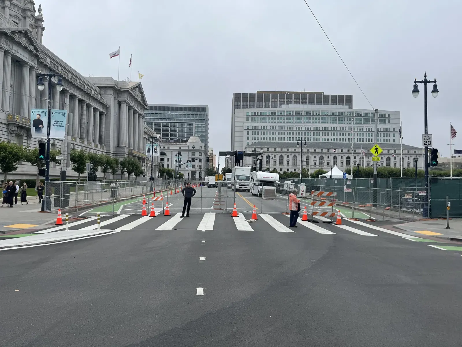 A street in San Francisco with a protected bike lane, illustrating the context of event street closures.