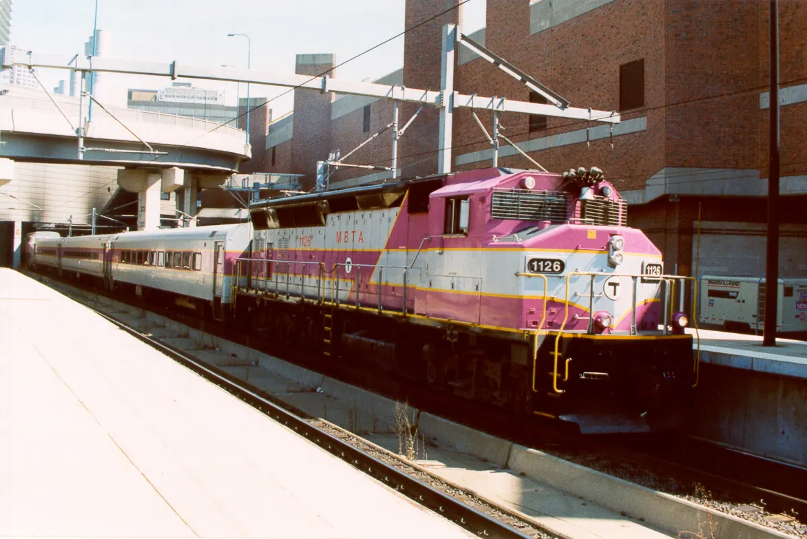 Massachusetts Bay Transportation Authority commuter rail train at South Station in Boston, illustrating a transit funding model not available to London’s TfL