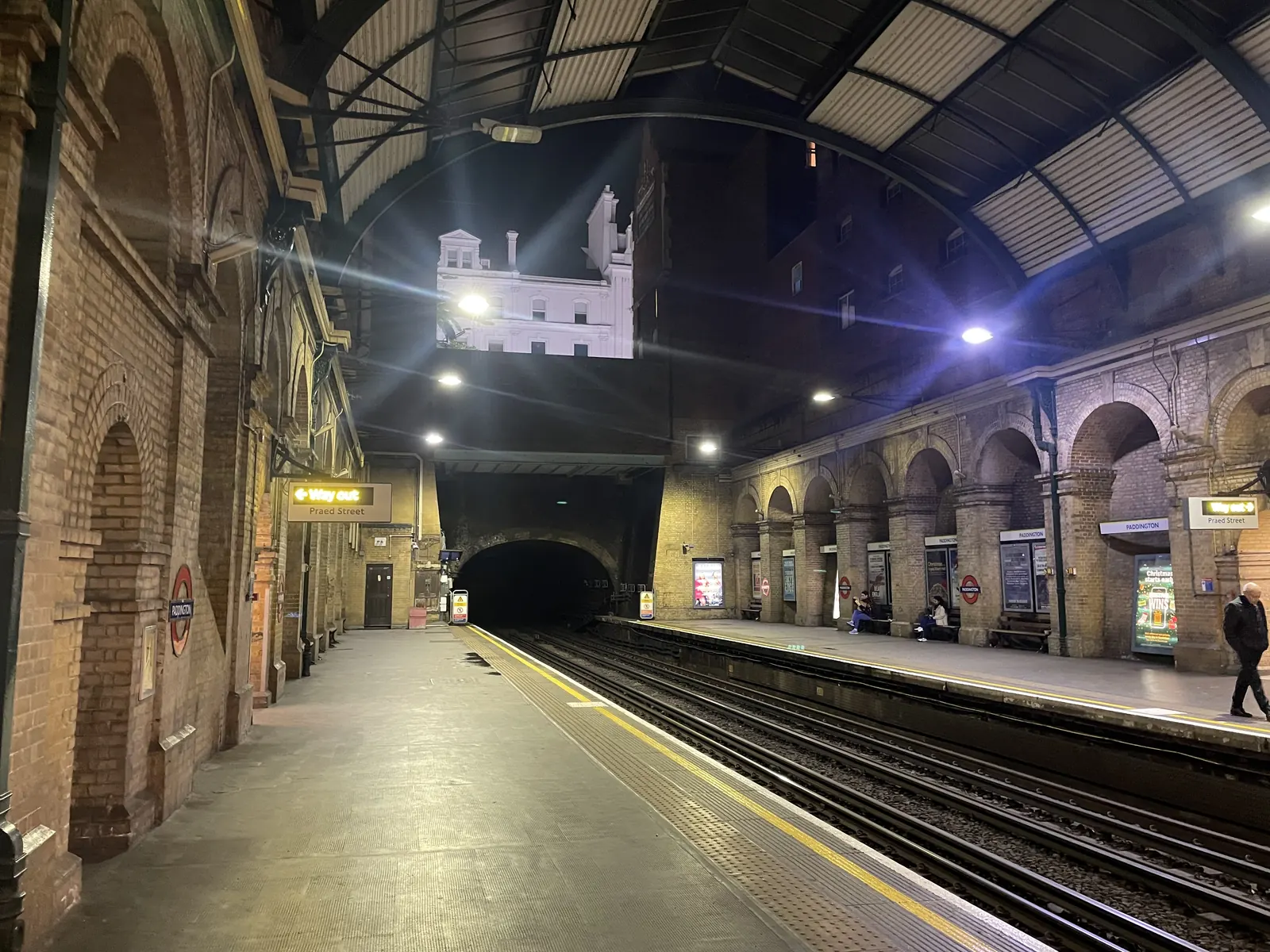 An empty platform on the London Underground's Night Tube service, illustrating night-time public transport availability.