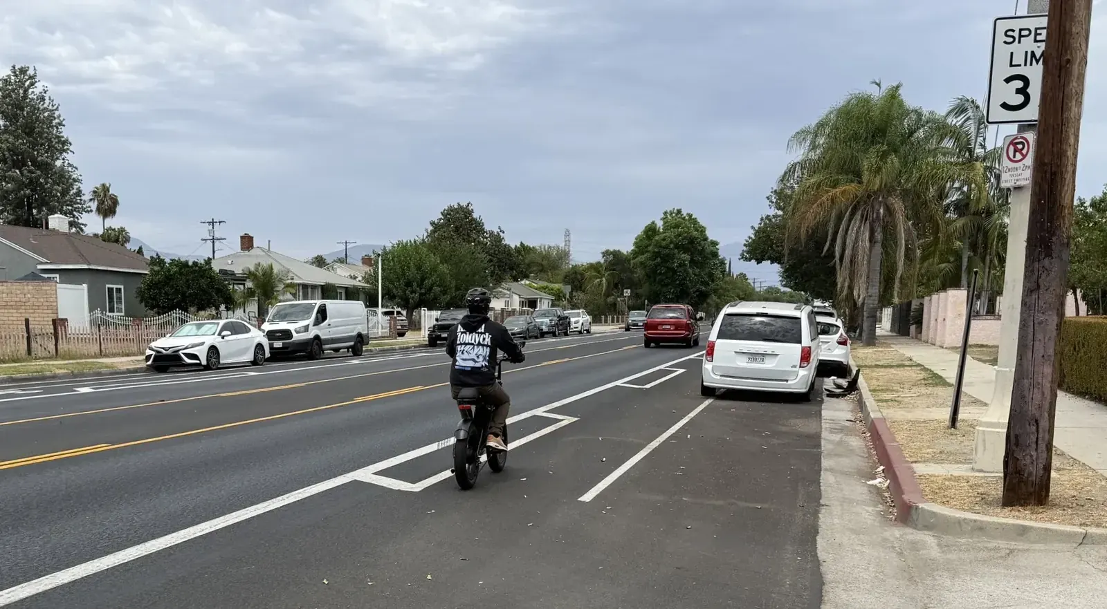Van Nuys Boulevard in Los Angeles during light rail construction, with car lanes and parking retained and bike lanes removed
