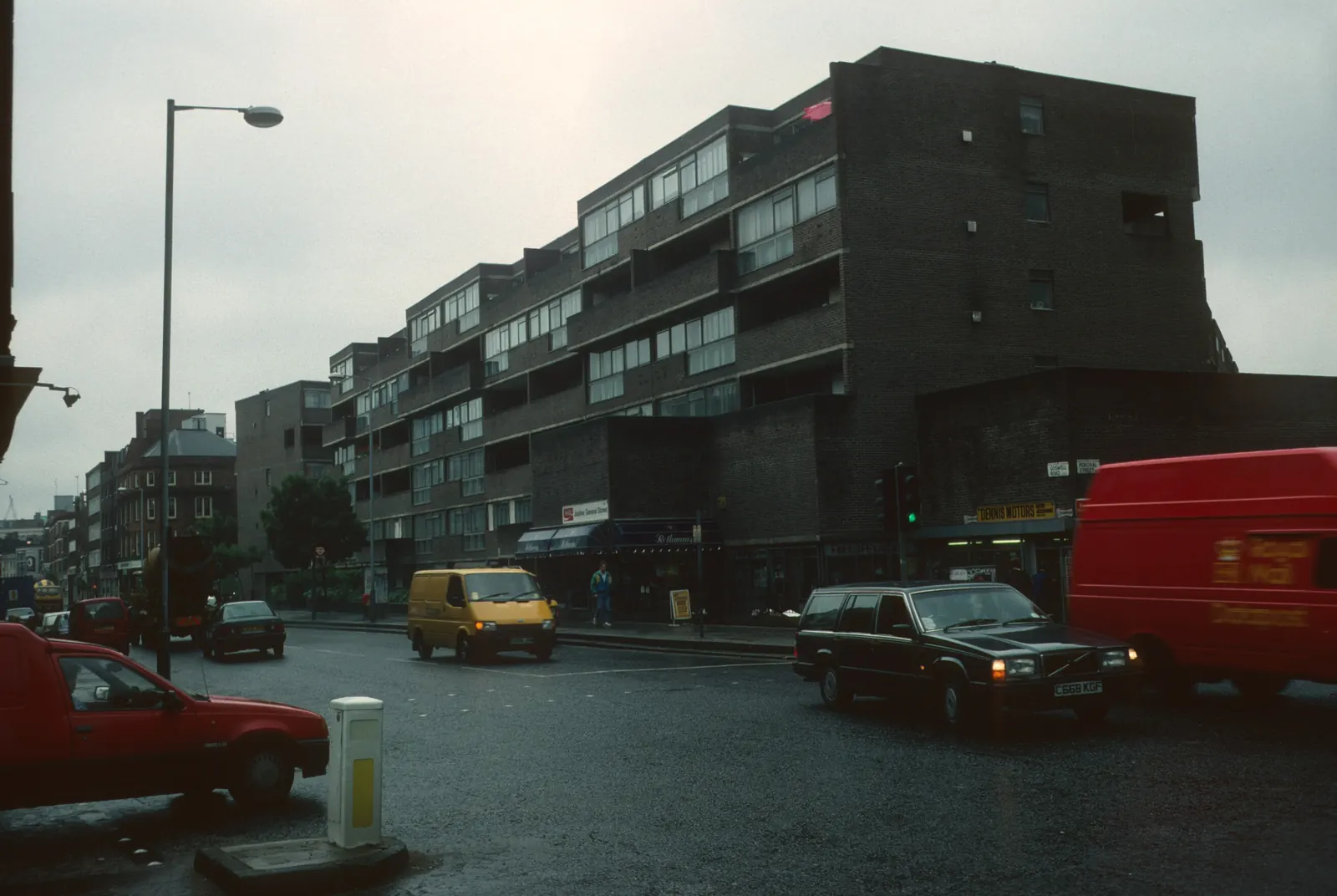 Residential street in London with visible energy efficiency measures on buildings