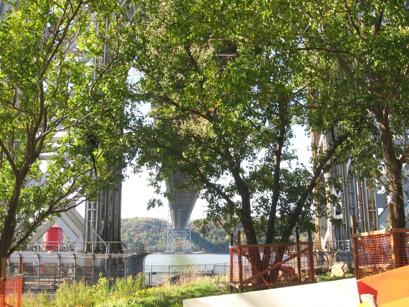 The aging Fort Washington Park Bridge on the Hudson River Greenway in northern Manhattan, showing visible signs of disrepair.
