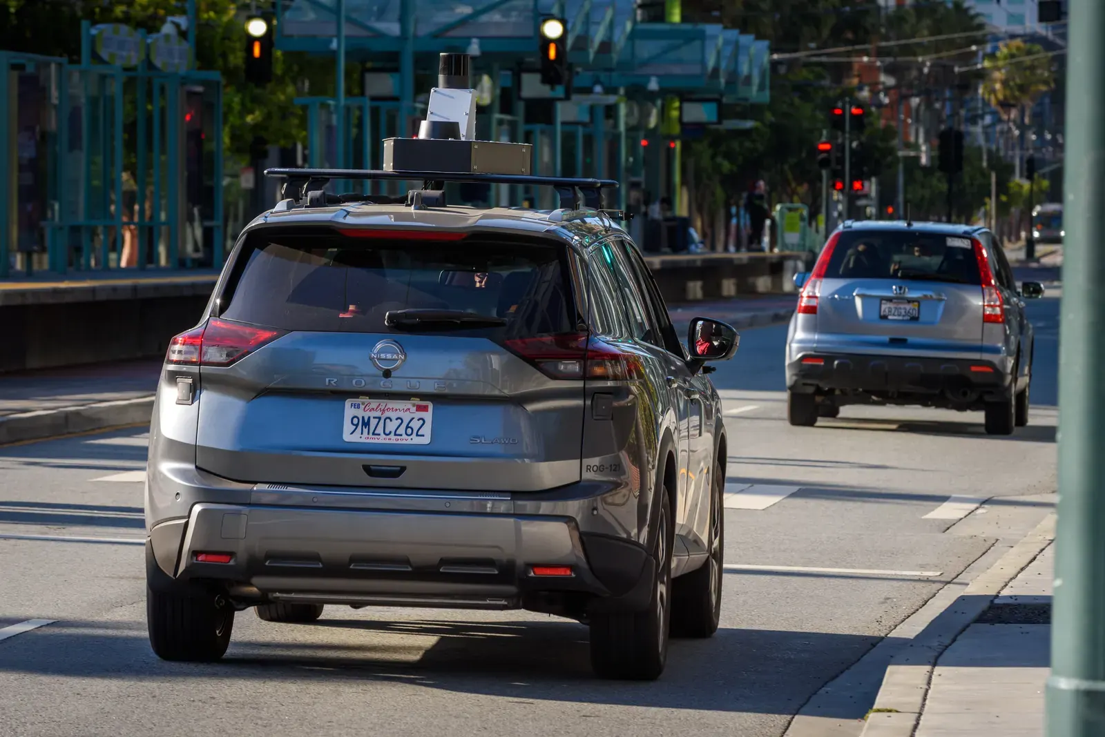 A graphic illustrating various sensors used in autonomous vehicles, such as lidar, radar, and cameras.