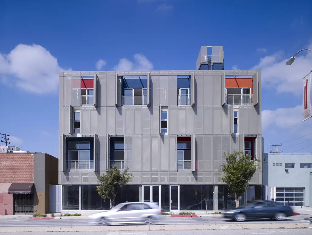 Exterior view of a newly completed multi-story affordable housing building in Los Angeles.