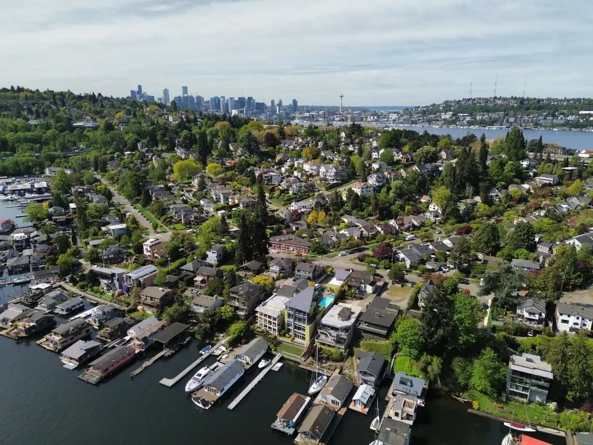 Seattle skyline viewed from above, showing a mix of downtown high-rises and surrounding residential neighbourhoods